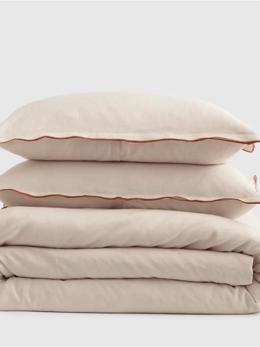 Quince Linen Cream Pillowcases with Tan Piping